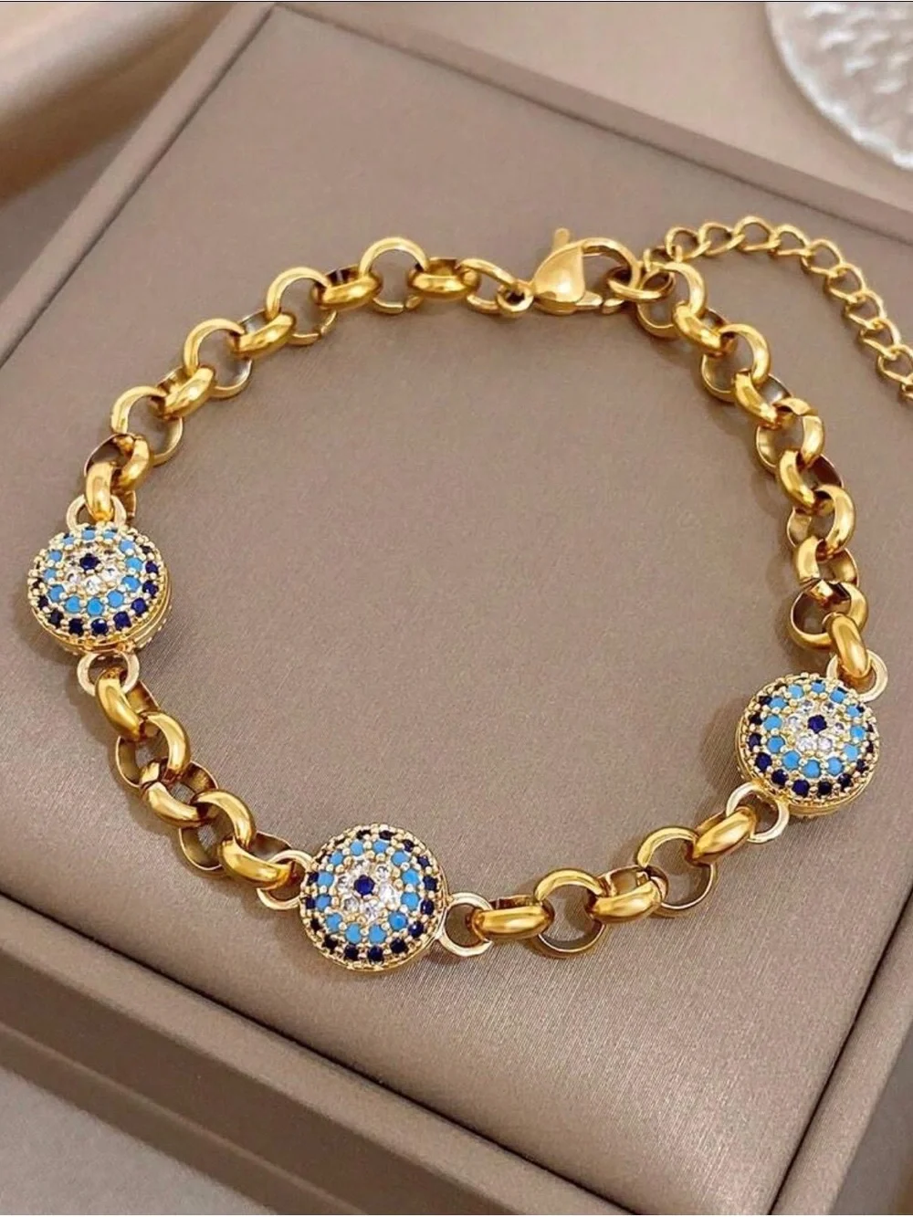 Gold-Tone Bracelet with Blue and White Crystal Discs